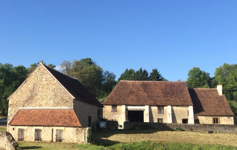 The out-buildings seen from the lake